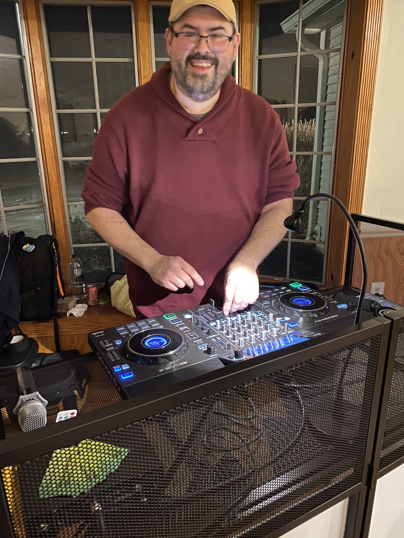 DJ Jesse B. smiling behind his controller